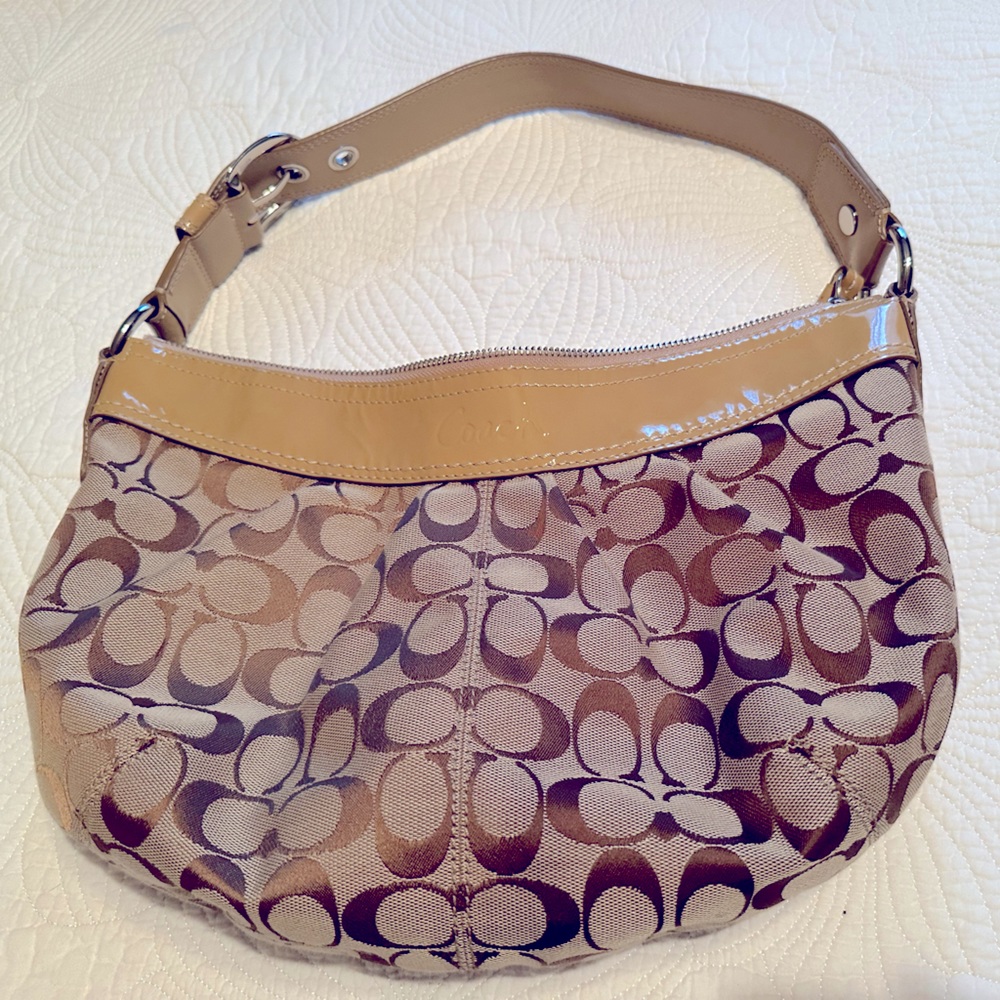 Coach Purse in tan patent leather with logos